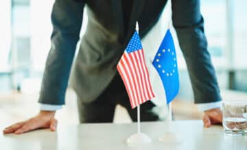 businessman european american flags