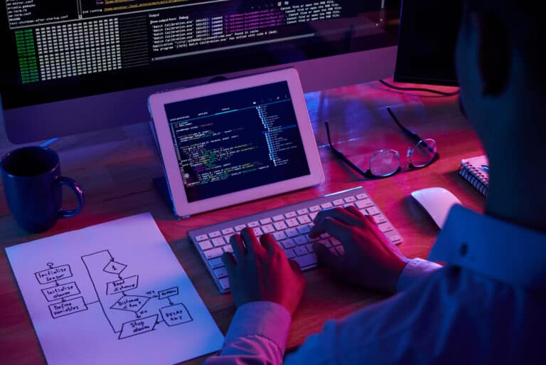 professional programmer working late dark office